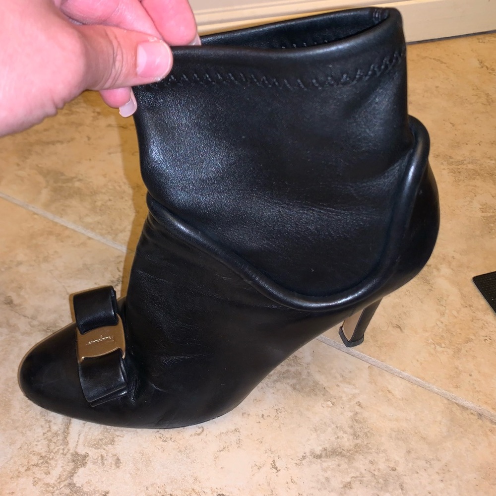 Black leather Salvatore Ferragamo booties.